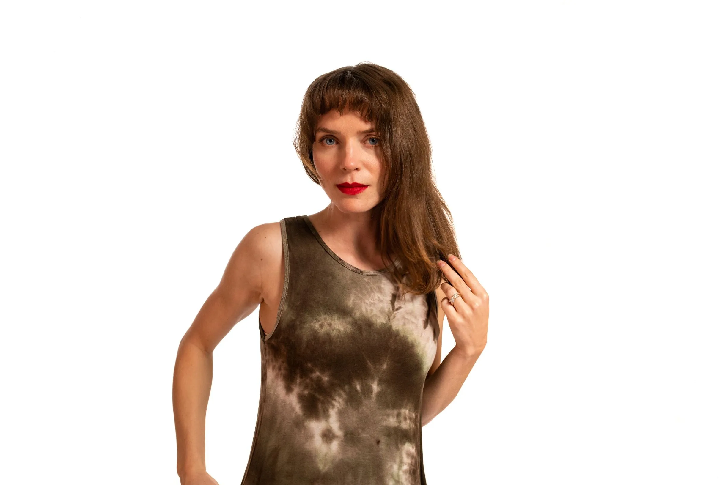 Women's A-line dress 2" above the knee sleeveless and side pockets.